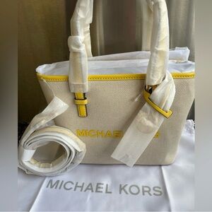 NWT Michael Kors Cream and yellow jet travel crossbody